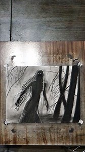 Charcoal drawing of a haunting dream.