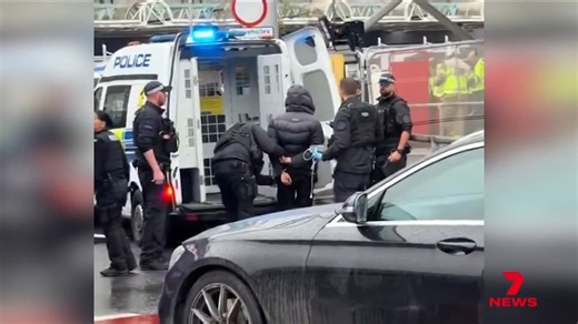 There has been chaos at London's Heathrow Airport - a woman robbed and 21 people injured during an attack involving pepper spray. It happened at the terminal used by Qantas, sparking a major police response. | 7NEWS Adelaide