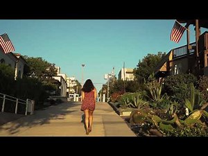 Young Woman Walking Through The Streets - HIGH DEF 4K ULTRA Stock Footage