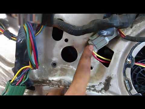 How to Replace Front Door Window Motor in a 1981-1989 Lincoln Town Car