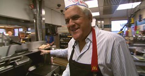 Leno works a hamburger fryer at McDonald's