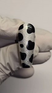 Chrome cow print design by @nailsbyshaafia 🐮 🤍 Osiris 🖤 Glossy Top Coat 🤍 180 Buffer 🖤 Serious Black 🤍 Gel Top Coat Nail Sealer 🖤 MCB10 Urban Graffiti Chrome Pen Shop now at www.naio-nails.com and get 13% OFF for our Friday 13th FLASH SALE 🔥 Enter code FRIDAY13 at checkout for a nice little discount - this weekend only! Applies to UK orders only! Free delivery also available when spending over £35 🥰 #NaioNails #UrbanGraffiti #NailArt #NailTutorial #CowPrint #ChromeNails | Naio Nails UK