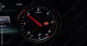 Modern car tachometer or rev counter. Revving up a diesel engine. Close up shot, real time, no people