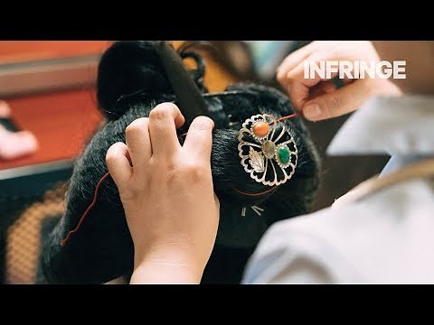 A rare look at the creation of a traditional hairstyle of a Geiko-in-training