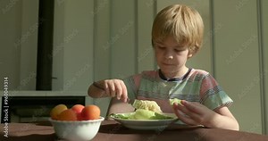Cute Kid Boy Eat Spaghetti with Cucumber Vegetarian Food For Breakfast or Dinner. Slow motion 60 fps 4K 10-bit Stock Video