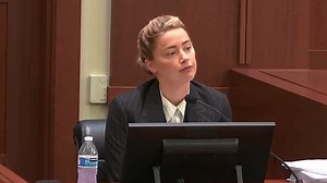 Amber Heard hits back at accusation she assaulted another partner