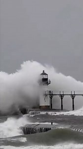 Massive Wave Explosion off the St. Joseph Lighthouse. Its hard to keep the camera steady in 60mph Winds. St. Joseph, Michigan #michigannativephotography #fblifestyle #waves #puremichigan #lakemichigan #SaintJoseph #wintertime #wintervibes | Michigan Native Photography