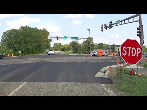 What are huge stop signs and flashing red lights?