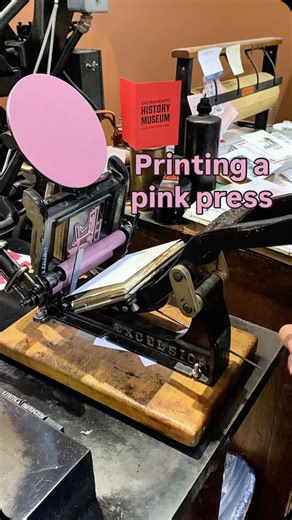 October 9th is International Print Day! We needed to post another video of us showing printing a printing press with another printing press. In this video, Alex letterpress printed an image depicting the first printing press in what would later become the United States, which was Stephen Daye’s wooden common press from 1639. This was printed with pink oil base ink using a 3x5 Kelsey Excelsior tabletop printing press. 130 prints were made during this press run. These are prints we hand out to vis