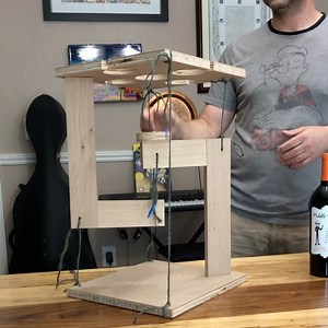 Decided to spend an hour prototyping a wine table idea. What do you think of this? The floating table is actually the easy part of this! Thank you @radeksworkshop for the inspiration! So, what do you think? With nicer wood and string, plus some redesign of the wood, would you want this to hold your wine? #prototype #woodworkproject #woodworkingproject #magictable #floatingtable #tensiontable #winestand #winetable #wine | Newman Specials Custom Woodworking