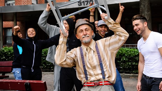 A grandpa surprises the crowd with rap skills
