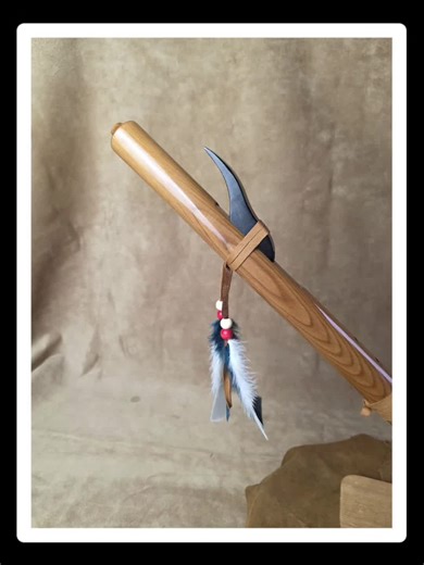 This stunning Western red cedar flute is characterized by its lightweight construction, stained pine block, and soothing, earthy tone in the key of G. It is currently available for purchase. The flute's six-hole design features a leather wrapping midway, covering the fourth hole from the bottom, effectively making it a more accessible five-hole flute for ease of playing. For further inquiries, please contact me directly.