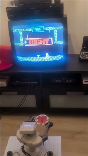 Nintendo R.O.B. playing Gyromite. Even robots gotta keep in shape.