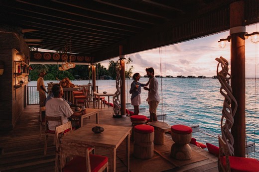 Where Stories Surface At the far end of the pier, where fins meet the water, The Dive Bar & Snorkelers Lounge is Hadahaa’s after-adventure living room. Fresh from the reef, divers and snorkelers gather here to rinse off the salt, trade stories of shark shadows and turtle encounters, and relive the day’s best moments. Sink into a lounge chair, order a perfectly chilled piña colada, and watch the sky melt into shades of gold and violet over the Indian Ocean. As the last light fades, the soft glow 