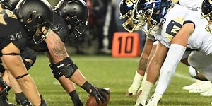 Watch a Former Army Green Beret Congressman Root for Navy Football—as a Warning About Deepfakes