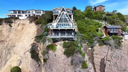 Heavy rains and landslide leave homes on edge of California cliff