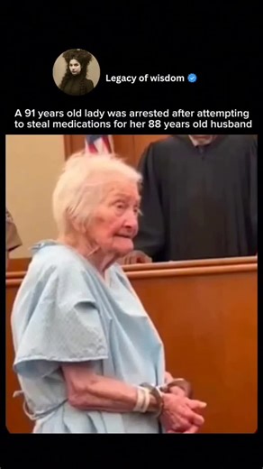 Legacy of wisdom on Instagram: "heartbreaking images circulating on media about this lady. She’s 91 years old, standing in a hospital gown, hands in chains. Arrested for felony theft. The judge could hardly believe it. Helen and her husband George, 88, have been married 65 years. He has severe heart failure and needs medicine every day just to stay alive. They live on a fixed income, barely scraping by. Last month, their supplemental insurance lapsed after they couldn’t afford the payment. When 