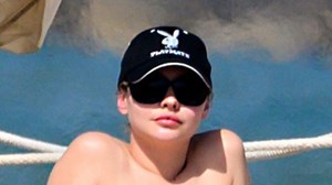 Outer Banks’ Madelyn Cline rocks a teeny red thong bikini on beach in Spain