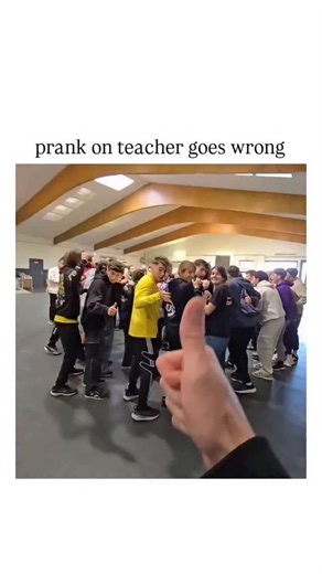 education.decodee on Instagram: "- The post shares a 28-second video from a university campus where students stage a chaotic mock brawl to ambush their professor, only for it to pivot into a heartfelt birthday surprise complete with cake and confetti, originally posted on Instagram by @campus.univers.cascades. - It amassed nearly 700,000 views and 3,800 likes within hours, sparking replies that blend laughter over the teacher's startled reaction with debates on its authenticity, including claims