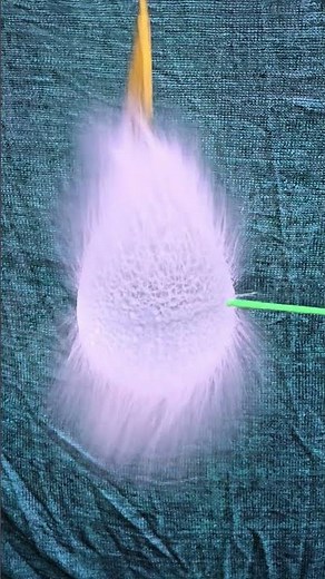 "Witness the incredible balloon pop in stunning slow motion!"