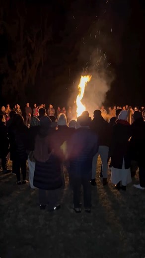 John Tilton on Instagram: "We have been doing this New Year’s Eve fire ceremony for over 45 years. Every single year. This year the weather was cold and everyone was bundled up. It was a particularly wonderful experience this year. First, everyone meets in the Temple for chanting. Then we come out and circle the fire. And then people come up and throw their piece of paper into the fire to the chanting of a particular sacred mantra. This is all well orchestrated so that it flows in a very beautif