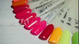 Color examples of nails in the salon manicure Stock Video