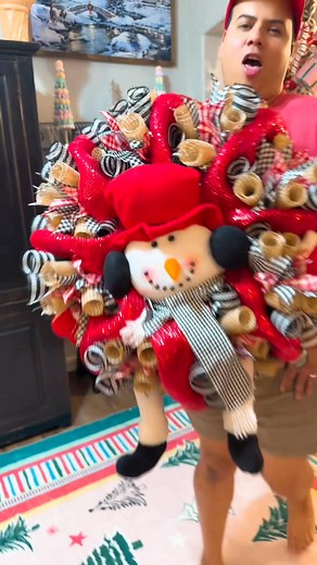 🎉✨ Houndstooth Snowman Wreath! We've just completed a beautiful snowman-themed mesh wreath that’s sure to bring some extra cheer this season! ❄️☃️ At the center, a cute plush snowman head sports an adorable houndstooth scarf, surrounded by gorgeous houndstooth and plaid ribbons in vibrant red, black, and beige tones. This festive piece is heading to a new home, ready to spread joy and warmth. Who else loves handmade holiday décor? 🎀❤️ #WinterWonderland #HandmadeWreaths #SnowmanStyle #ThePerfec