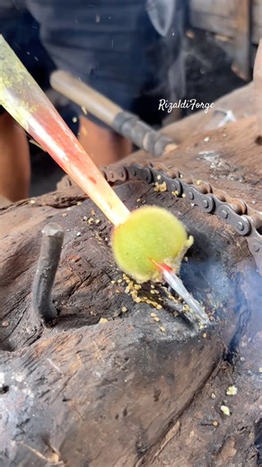 Unique craftsmanship as a blacksmith shapes a garden tool. 🔥 #blacksmiting