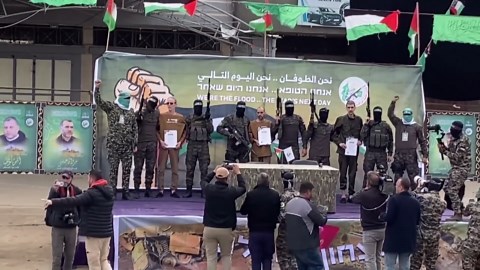 Hamas releases three Israeli hostages, including Eli Sharabi, to Red Cross in central Gaza