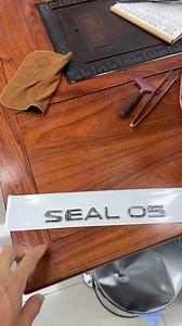 Logo SEAL 05 | Optimus Cambodia 555