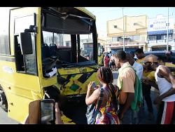 Vendor killed as JUTC bus crashes into building downtown Kingston