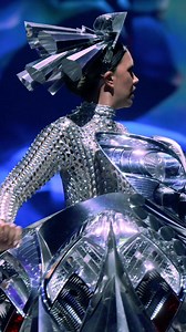 137K views · 2.6K reactions | An elegant exoskeleton of junkyard car parts. Tailgater merges automotive innovation with timeless elegance, creating a striking fusion of form and function. This award-winning piece from the 2024 Open Section captivated with its daring concept and bold stage presence, earning Third Prize in the category. Garment credit: Tailgater, Kerri Barrie, Australia | World of WearableArt (WOW) | Facebook