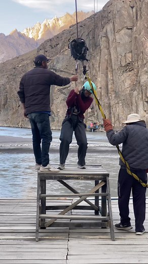 "Flying into thrill mode! 😎✨ Lady lands in style on the Zip Line! Adventure vibes, landing joy! #ZipLineFun #AdventureAwaits #ThrillSeeker #OutdoorVibes" | HunzaValley OnLens