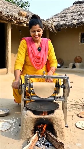 A roti making machine making roties.