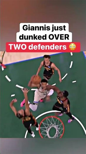 Giannis just dunked OVER TWO defenders 😳 #nba #basketball #hoops