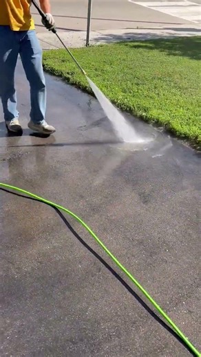 Regular asphalt driveway cleaning removes dirt, oil and debris. #drivewaycleaning #springcleanup