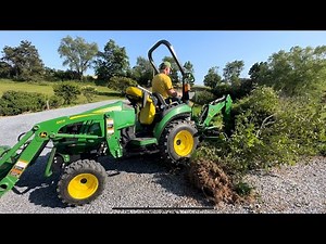 #13 Shrub and Tree removal with 260B Backhoe on a John Deere 2025R