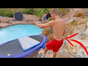 CATAPULTING TRAMPOLINE SLIP N SLIDE INTO POOL!