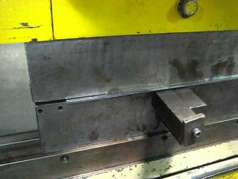 Forming a stiffener rib on a steel plate in a press brake.