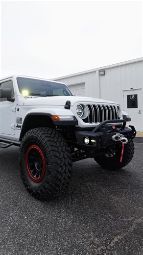 Akins Ford Chrysler Dodge Jeep Ram on Instagram: "💬 DM for Inquiries 2026 JEEP WRANGLER SAHARA STK# TW168293 🎨 Bright White Clearcoat 🔹TAZER MINI 🔹RUGGED RIDGE FRONT BUMPER 🔹WARN WINCH W/ SYNTHETIC ROPE 🔹BAJA DESIGNS A-PILLAR LIGHTS 🔹JKS J-KONNECT 2.5” LIFT KIT 🔹FOX 2.0 SERIES SHOCKS 🔹METHOD 709-HD 17” SATIN BLACK WHEELS 🔹METHOD 709 IMPACT RINGS - ANODIZED RED 🔹NITTO TRAIL GRAPPLER 37/12.50R17 TIRES 🔹N-FAB RS SERIES NERF BARS 🔹SMITTYBILT HD TIRE CARRIER 🔹AMERICAN FLAG DECALS 🔹WIND