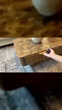 Elegant coffee table with plenty of storage and marble top