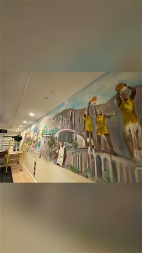 Hand painted custom sports mural installation.