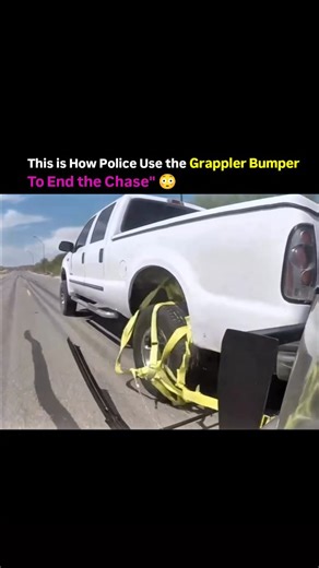 Batman on Instagram: "The grappler bumper is a police tool designed to stop fleeing vehicles safely. It is mounted on the front of a patrol car. When officers get close, the device launches a strong nylon strap that hooks onto the rear wheel of the suspect's car. The strap locks the wheel, forcing the vehicle to slow and stop under control. This lowers the chance of crashes, injuries, and property damage. It also gives officers a safer option than spike strips or PIT maneuvers. You benefit from