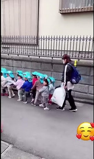 How preschool kids going for outdoor play with teachers in japan