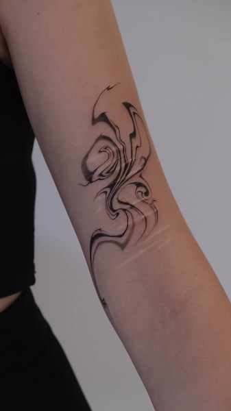 2022 Tattoo Trends: Abstract, Flow, and Swirl Designs