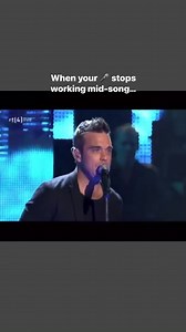 913K views · 6.9K reactions | We all love it when Robbie Williams flips his ! But this is what happens when it stops working mid-song  Kudos to Mark Owen for keeping going. Thanks to Kelly M for pointing out this unusual mic flip #robbiewilliams #takethat #markowen #theflood #micflip #theshowmustgoon #robbielive | Robbie Williams Rewind Podcast | Facebook