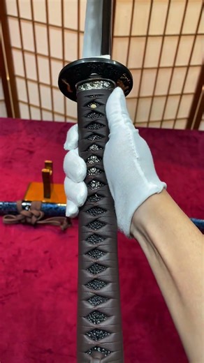 Custom katana, kobuse-gitae, hundred-fold folded patterned steel, with clay tempering and sashikomi.