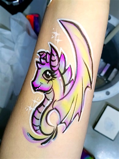 Dragon arm paint! I'll be posting the full video and tutorial showing how I created this piece! It's simple, cute and perfect for kids that want something on their arms instead! #painting #dragon #facepaint #armpainting #tattoo