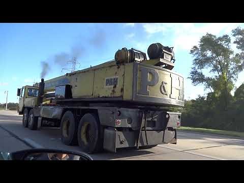 P&H Hydraulic Truck Crane take off from intersection with engine just screaming