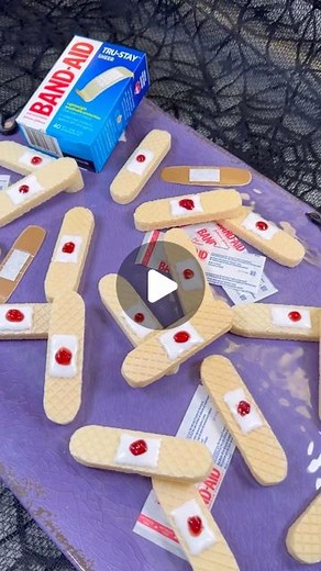 Genevieve LaMonaca on Instagram: "Edible Bloody Band-Aids. Follow @chefgenevieve for 30 Halloween inspired recipes Ingredients: 20 vanilla wafers White cookie icing Seedless raspberry jam Directions: Use a microplane to file off the corners of the wafer cookies. Pipe on icing sugar in the middle in a square shape. Once dried, add a small dollop of seedless raspberry jam in the center. #halloweenfood #halloweeninspo #ediblebandaids"